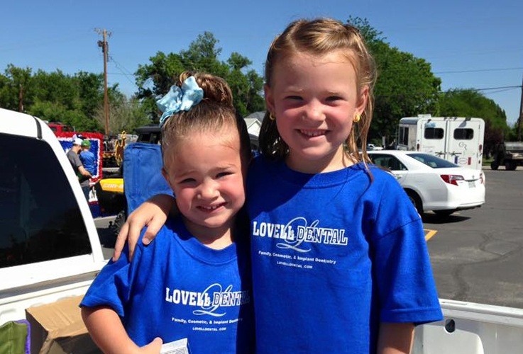 two young girls with Lovell Dental shirts on