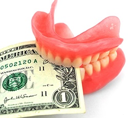 Dentures in Lovell, WY with dollar bill