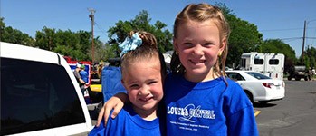 Two children at community event