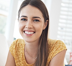 Young woman with straight smile