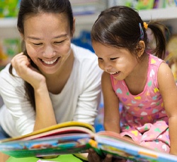 parent reading to their child