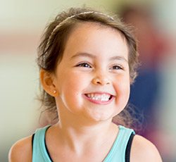 Laughing child with healthy teeth