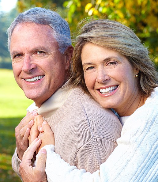 Smiling senior couple outdoors