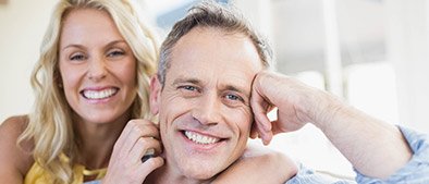 Man and woman smiling together