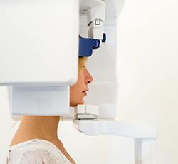 Woman receiving cone beam scan