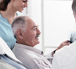 Senior man in dental chair