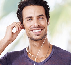 Smiling man with headphones