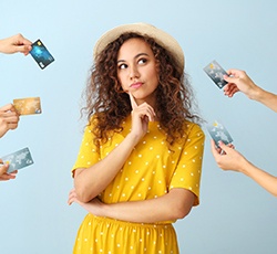 Woman surrounded by credit cards