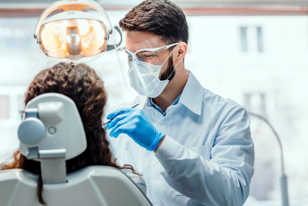 dentist replacing lost dental filling